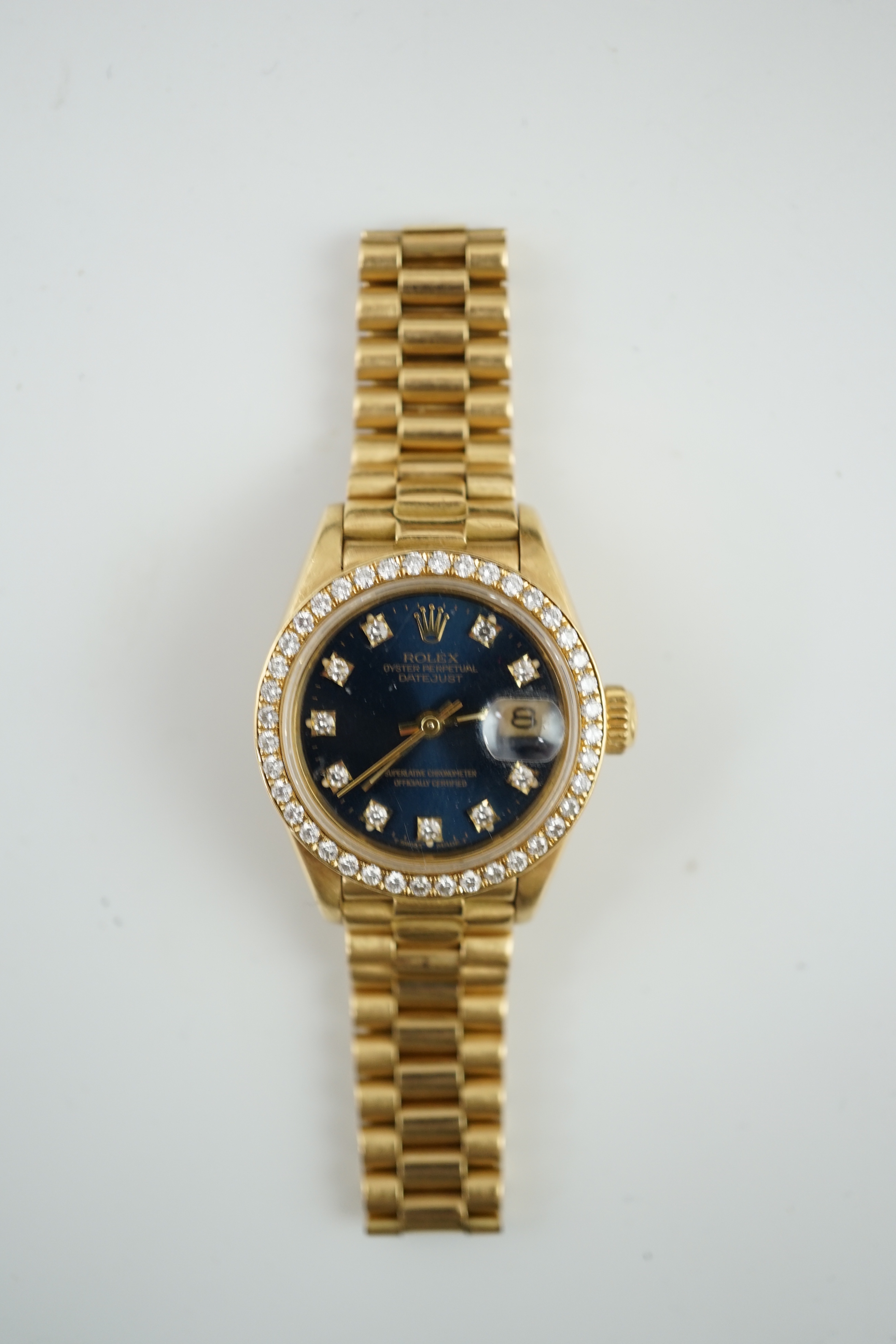 A lady's 1990 18ct gold and diamond set Rolex Oyster Perpetual Datejust wrist watch